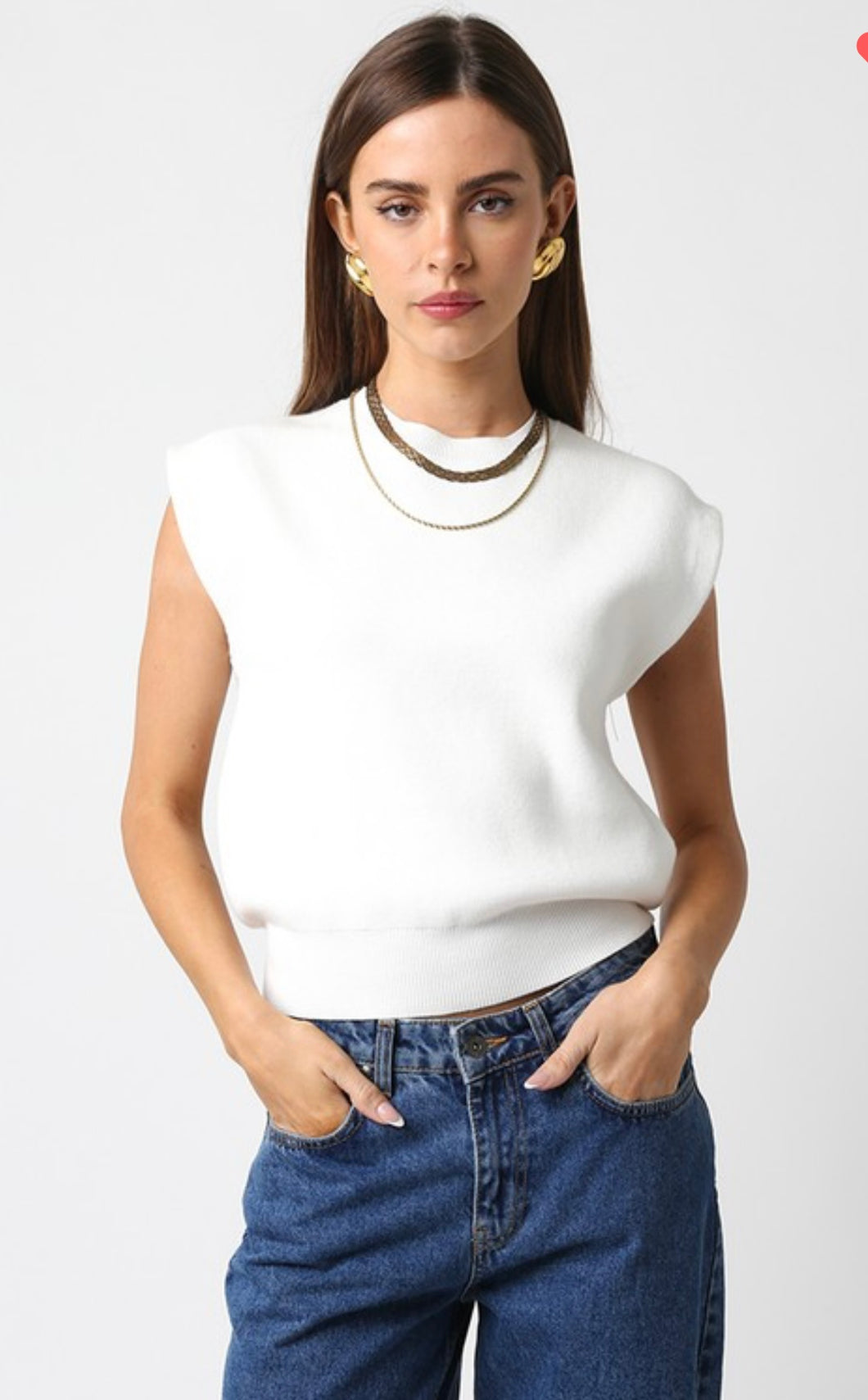 White sleeveless sweater